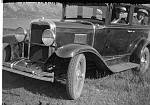 CW0202.jpg    Bilen til Karl Karlsen  Neverdal. 1930.<br>Karl på Stranda fikk sin første bil av merke Rugby i 1929.<br>Den ble byttet ut i 1930 med en helt ny Chevroletregnr.: W-745, (den på bildet). Bilen ble i 1936 solgt til Edvard Boldevin.  Både Knut Bye og Leif Stavne eide denne bilen først på 1960 tallet.